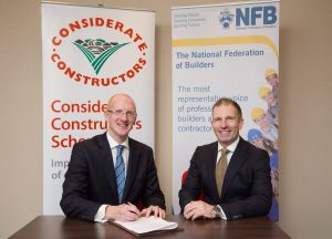 Real industry collaboration to offer members greater benefits London, United Kingdom, 21 November 2016: The Considerate Constructors Scheme - the national scheme established by the construction industry to improve its image - and the National Federation of Builders (NFB) – the construction industry’s longest established trade association - have formed a partnership to promote best practice and raise standards across construction industry SMEs. This first, truly ground-breaking collaboration between two construction industry organisations heralds a new way in which like-minded organisations can work effectively together to offer greater benefits to members, at no additional cost. The partnership will provide NFB members, with a turnover banding of £500,000 to £3.5 million, free Company Registration with the Considerate Constructors Scheme. It will come in to effect from 1 January 2017. By becoming a registered company, NFB members (in this banding) will have the opportunity to demonstrate their commitment to improving the image of the industry. Scheme-registered companies voluntarily agree to abide by its Code of Considerate Practice. The Code commits those registered with the Scheme to care about appearance, respect the community, protect the environment, secure everyone’s safety and value their workforce. Considerate Constructors Scheme Chief Executive Edward Hardy said: “SMEs are a critical part of the construction industry’s future success. They have a huge role and responsibility to continually raise their standards and, in doing so, make a valued contribution to improving the image of the industry. “The NFB provides a great platform for the Considerate Constructors Scheme to help support SMEs in championing the principles of considerate construction. We are therefore delighted to establish this partnership with the NFB.” Richard Beresford, Chief Executive of the NFB said: “We’re delighted to join forces with the Considerate Constructors Scheme to offer added value to our members. NFB members pride themselves on their professionalism and ability to deliver exceptional quality, so it’s great that their efforts can now be recognised as part of the Scheme. “SMEs often miss out on opportunities simply because they don’t have the resources to complete the multitude of registrations and benchmarking initiatives available in the industry. By collaborating in this way, we hope to reduce this burden and improve access to opportunities, working towards achieving a fair playing field for SMEs in construction.” A record number of over 900 company registrations have been made with the Scheme so far this year, with a total of more than 4,100 company registrations taking place since this type of registration was introduced by the Scheme in 2009.