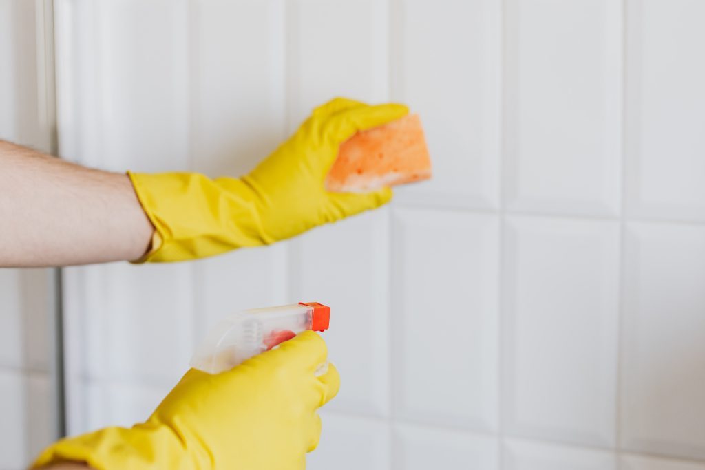 Cleaning tiles with sugar soap - Ready to plaster over the tiles